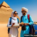 Home 20 수단 여행 비자 발급법 - A professional scene depicting a Bengali tourist couple at Sudan’s historic pyramids, dressed in mod...